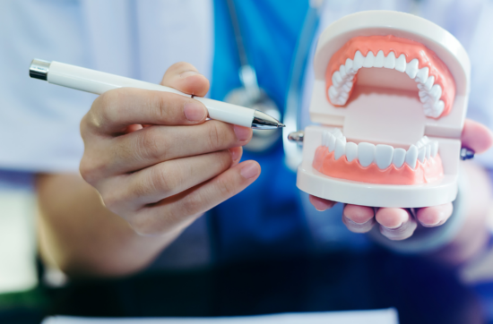 dentist showing a dental care plan